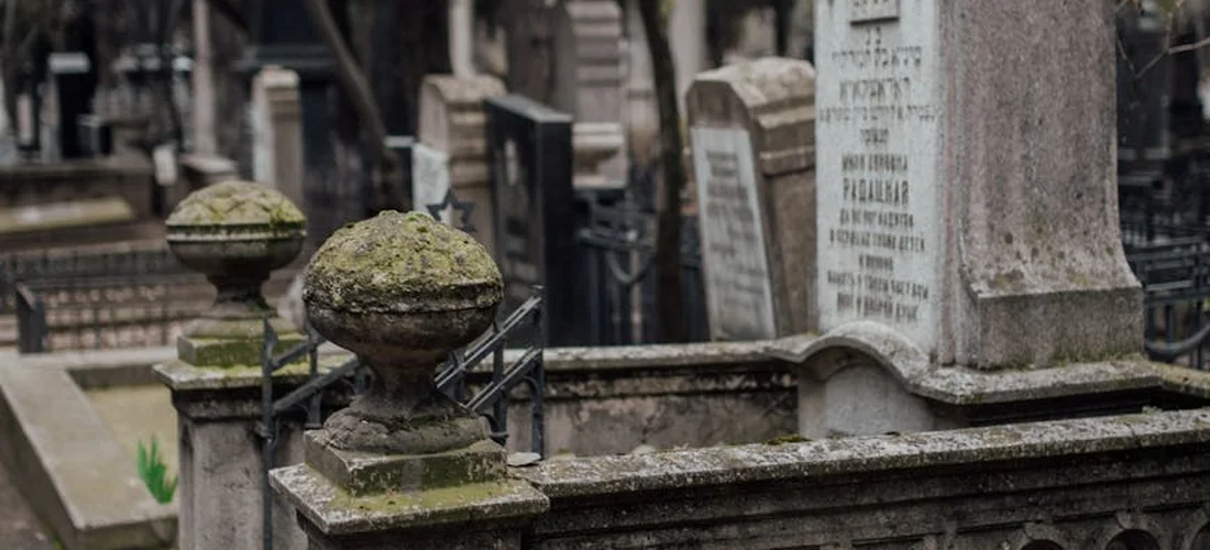 Weathered tombstones in a cemetery