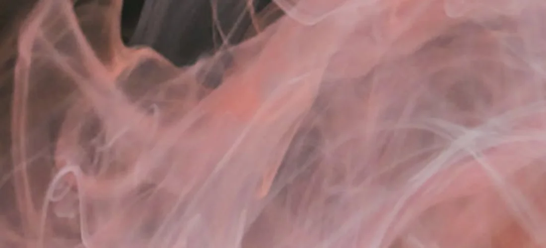 Close-up image of pink smoke or vapor