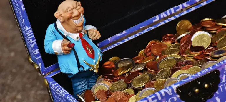Cartoon figure in a blue suit stands inside a treasure chest filled with coins, illustrating funeral costs and financing options.