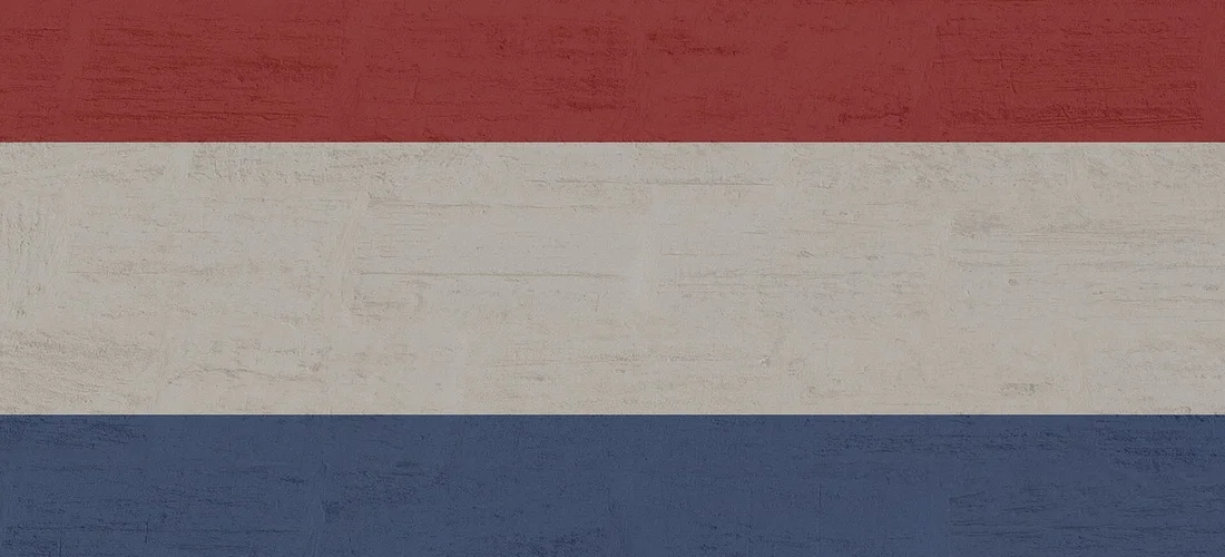 Horizontal tri-color flag with red on top, white in the middle, and blue on the bottom.