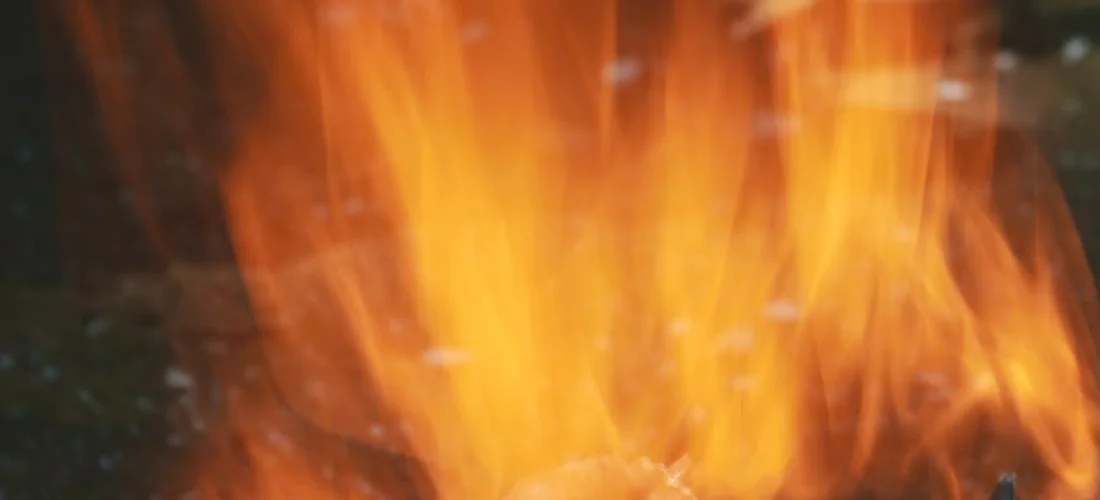 Close-up of orange flames during a cremation